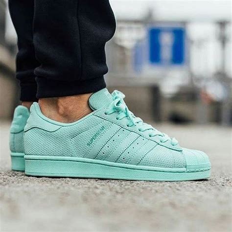 Adidas turquoise and mint green